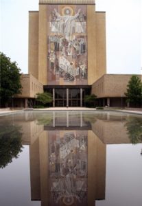 This July 31, 2008 photo show the Hesburgh Library on the campus of Notre Dame University in Notre Dame, Indiana. The library is adorned with the mosaic "The Word of Life", which depicts Christ the teacher surrounded by saints and scholars. The mosaic is also referred to a "Touchdon Jesus", because it happens to align with end zone of Notre Dame's football stadium and it appears that Jesus is signaling touchdown.  AFP PHOTO/Karen BLEIER (Photo credit should read KAREN BLEIER/AFP/Getty Images)
