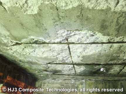 The concrete had de-laminated, exposing inner steel rebar to the mine's corrosive atmosphere.